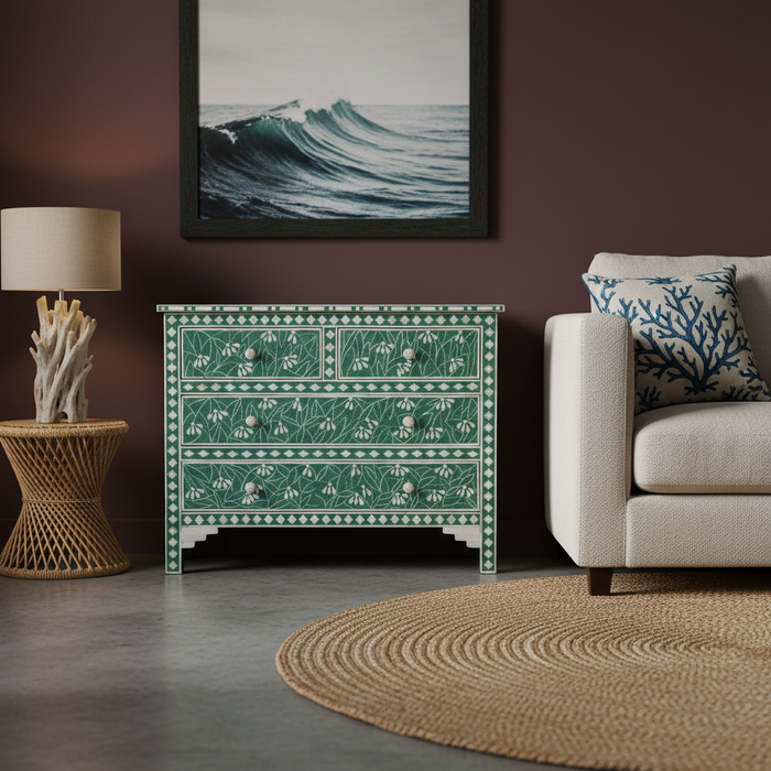 Living room with a green patterned side table, beige sofa, and framed artwork on the wall.