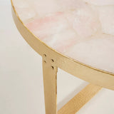 Pink stone top gold table