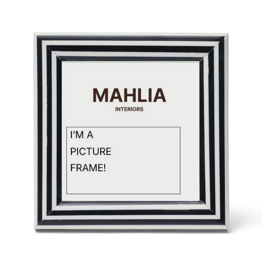 Black and white picture frame with 'MAHLIA INTERIORS' branding and text inside.