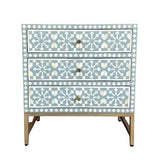 Three-drawer chest with decorative blue and white pattern on a white background