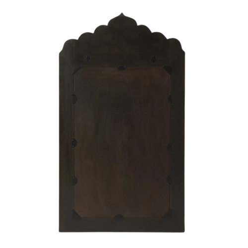 Dark brown rectangular object with scalloped edge on a white background