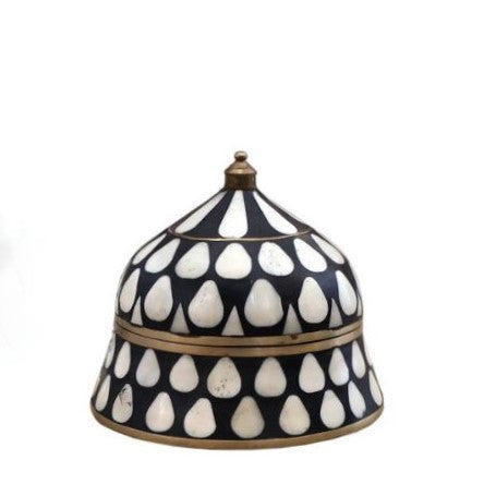A conical black bone and brass box with a traditional raindrop pattern and brass detailing.