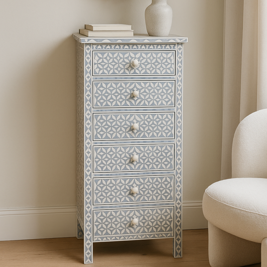 Decorative chest of drawers with geometric pattern in a room setting