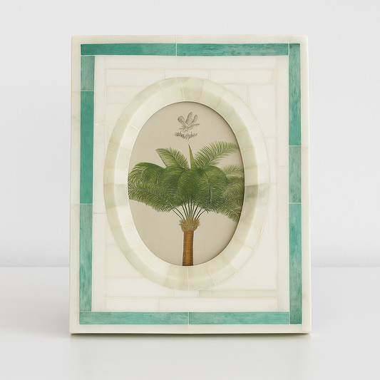 Framed artwork with a palm tree illustration on a white background