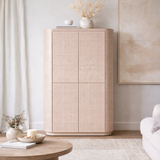 Beige cabinet with decorative items in a modern living room setting