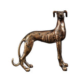 Bronze statue of a dog on a white background