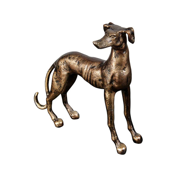 Bronze statue of a dog on a white background