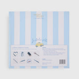 Vixen & Velvet product packaging with blue and white striped design