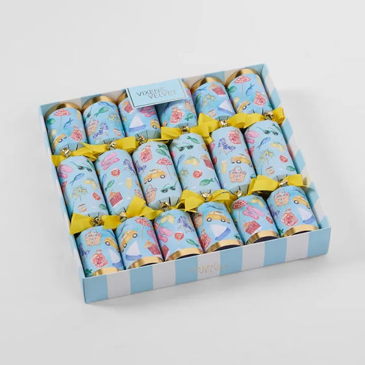 Box of colorful crackers with cartoon designs on a light gray background