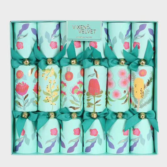 Decorative crackers with floral designs in a box labeled 'Vixen & Velvet'.