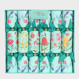 Decorative crackers with floral designs in a box labeled 'Vixen & Velvet'.