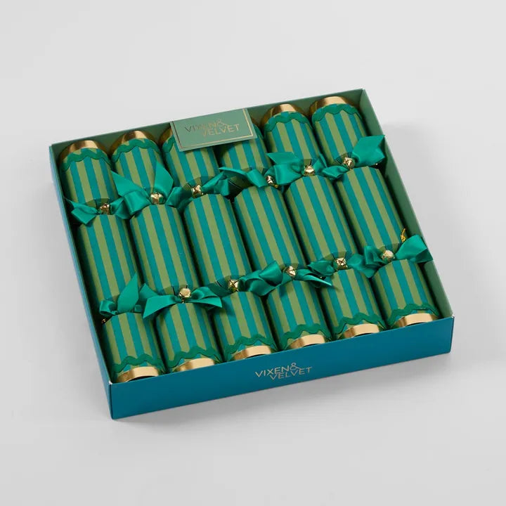 Box of green striped crackers with gold accents in a teal box, branded 'Vixen & Velvet'.