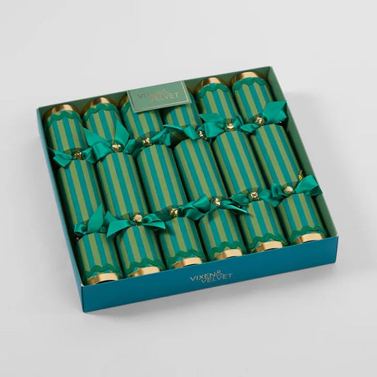 Box of green striped crackers with gold accents in a teal box, branded 'Vixen & Velvet'.