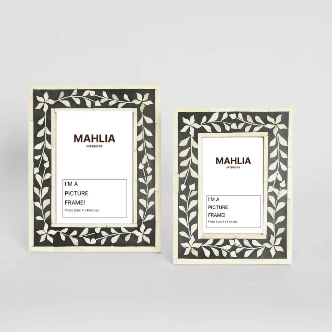 Two Mahlia picture frames with decorative black and white designs on a gray background