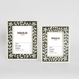 Two Mahlia picture frames with decorative black and white designs on a gray background