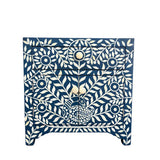 A blue and white bone inlay bedside cabinet with a peacock design.