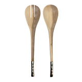 Two wooden spoons with black handles on a white background