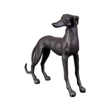 Black cast iron dog figurine on a white background